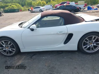 2014 Porsche Boxster с VIN WP0CA2A80ES120371, выставлен на аукционе IAAI как лот 42389545 с пробегом 49 966 миль миль и . История ставок и продаж доступна на DreamBid. Изображение 14.