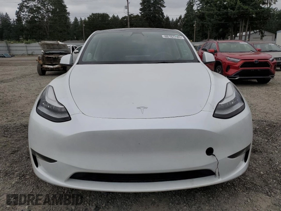 2023 Tesla Model Y Long Range z VIN 7SAYGDEE9PA081604, wystawiony jako Copart lot #60163785 z przebiegiem 42 134 mil mil oraz Szkoda całkowita • Salvage title. Historia ofert i sprzedaży dostępna na DreamBid. Obrazek 5.