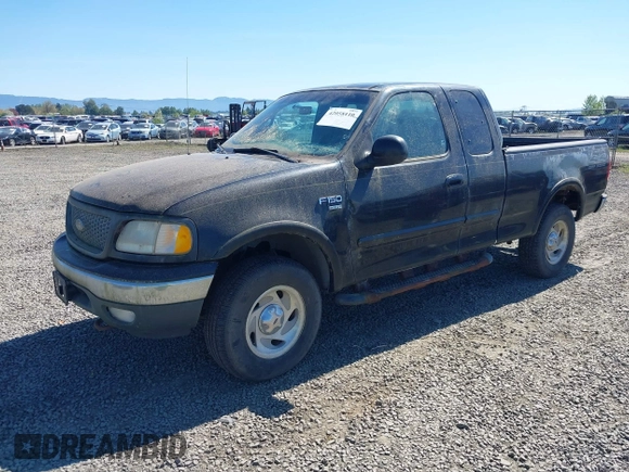 2000 Ford F-150 XL z VIN 1FTRX18L6YKB06492, wystawiony jako IAAI lot #42058110 z przebiegiem 169 217 mil mil oraz . Historia ofert i sprzedaży dostępna na DreamBid. Obrazek 2.