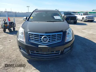 2015 Cadillac SRX with VIN 3GYFNAE30FS573125, listed as a IAAI auction lot 40972187 with 122,612 mi miles and . Bid and sale history available at DreamBid. Image 12.