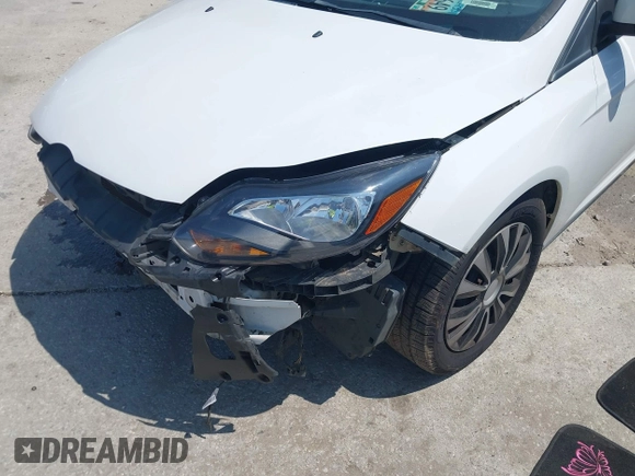 2012 Ford Focus SE with VIN 1FAHP3F24CL207735, listed as a IAAI auction lot 42131828 with 170,044 mi miles and . Bid and sale history available at DreamBid. Image 6.