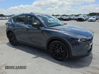 2024 Mazda CX-5 S Carbon Edition z VIN JM3KFBCL3R0481732, wystawiony jako Copart lot #56997135 z przebiegiem 32 887 mil mil oraz Tytuł czysty. Historia ofert i sprzedaży dostępna na DreamBid. Obrazek 4.