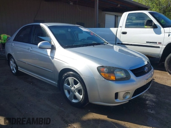 2009 Kia Spectra EX with VIN KNAFE221295026738, listed as a IAAI auction lot 41871548 with 238,130 mi miles. Bid and sale history available at carsss.com. Image 1.