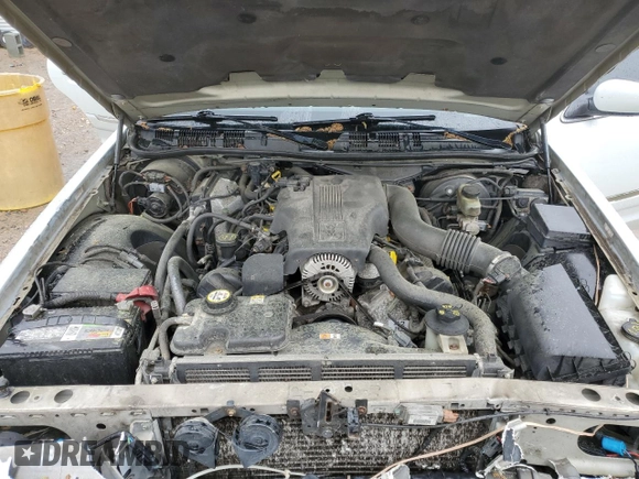 2003 Mercury Grand Marquis GS Convenience z VIN 2MEFM74W53X702387, wystawiony jako Copart lot #52852475 z przebiegiem 246 543 mil mil oraz Szkoda całkowita • Salvage title. Historia ofert i sprzedaży dostępna na DreamBid. Obrazek 11.