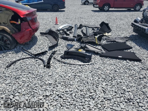 2024 Tesla Model Y Performance with VIN 7SAYGDEF1RF052175, listed as a Copart auction lot 51743895 with 4,869 mi miles and Salvage Title. Bid and sale history available at DreamBid. Image 12.