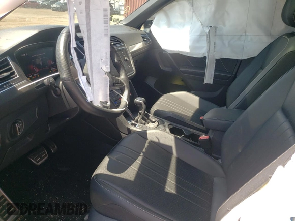 2023 Volkswagen Tiguan SE R-Line Black with VIN 3VV8B7AX2PM121851, listed as a Copart auction lot 59206135 with 23,723 mi miles and Salvage title. Bid and sale history available at DreamBid. Image 7.