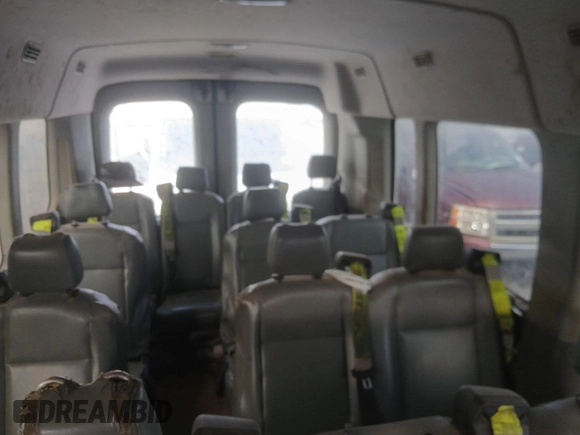 2019 Ford Transit Passenger XL z VIN 1FBAX2CM8KKA85224, wystawiony jako IAAI lot #42845272 z przebiegiem 142 658 mil mil oraz . Historia ofert i sprzedaży dostępna na DreamBid. Obrazek 18.