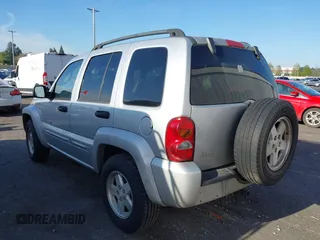 2003 Jeep Liberty Limited z VIN 1J8GL58K73W694818, wystawiony jako IAAI lot #42032227 z przebiegiem 217 446 mil mil oraz . Historia ofert i sprzedaży dostępna na DreamBid. Obrazek 3.
