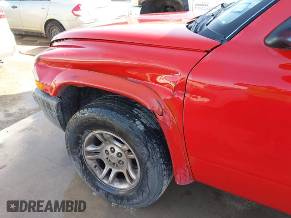 2003 Dodge Dakota Sport with VIN 1D7HL38X63S362491, listed as a IAAI auction lot 41642370 with 299,300 mi miles. Bid and sale history available at carsss.com. Image 6.