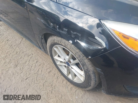2016 Ford Focus SE with VIN 1FADP3F20GL400887, listed as a IAAI auction lot 42358729 with 149,206 mi miles and . Bid and sale history available at DreamBid. Image 6.