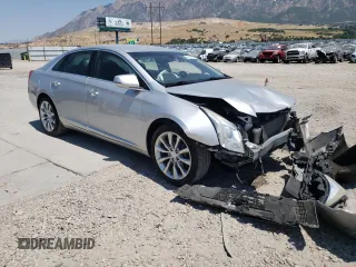 2016 Cadillac XTS Luxury Collection with VIN 2G61N5S35G9197325, listed as a Copart auction lot 55613225 with 131,404 mi miles and Salvage title. Bid and sale history available at DreamBid. Image 4.