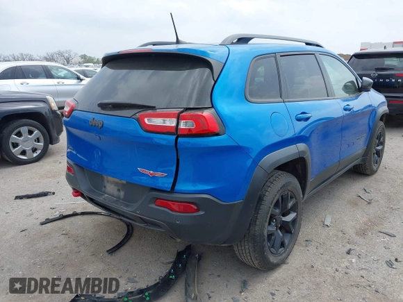 2018 Jeep Cherokee Trailhawk with VIN 1C4PJMBX6JD569684, listed as a IAAI auction lot 41925325 with 149,446 mi miles and . Bid and sale history available at DreamBid. Image 4.