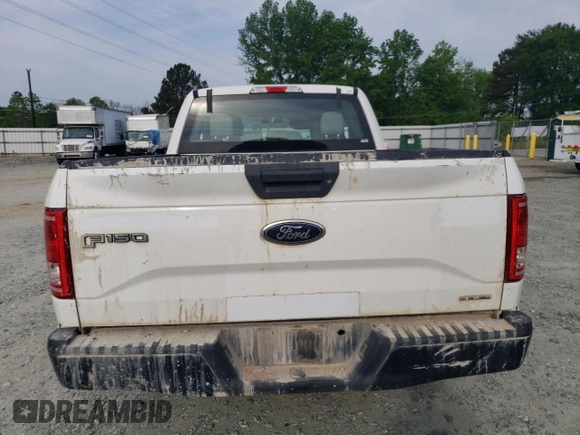 2015 Ford F-150 XL with VIN 1FTEX1C80FFB62967, listed as a Copart auction lot 52552435 with 154,977 mi miles and Salvage title. Bid and sale history available at DreamBid. Image 6.