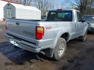 2003 Mazda B-Series 2WD Truck DS with VIN 4F4YR12UX3TM09535, listed as a IAAI auction lot 41610150 with 159,117 mi miles. Bid and sale history available at carsss.com. Image 4.
