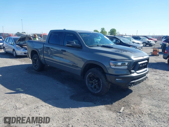 2023 Ram 1500 Rebel with VIN 1C6SRFLT2PN677577, listed as a IAAI auction lot 41991668 with 20,507 mi miles and . Bid and sale history available at DreamBid. Image 1.