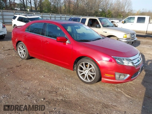 2011 Ford Fusion SE with VIN 3FAHP0HGXBR199597, listed as a IAAI auction lot 41950604 with 184,668 mi miles. Bid and sale history available at carsss.com. Image 1.