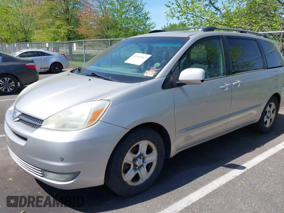 2005 Toyota Sienna XLE with VIN 5TDZA22C45S276838, listed as a IAAI auction lot 42149942 with 242,598 mi miles and . Bid and sale history available at carsss.com. Image 2.