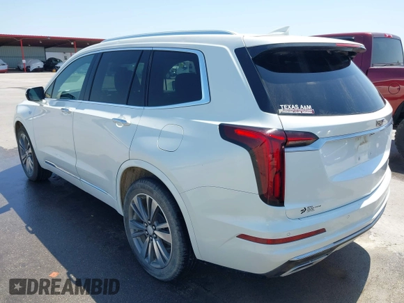 2021 Cadillac XT6 Premium Luxury with VIN 1GYKPCRS2MZ151718, listed as a IAAI auction lot 41978392 with 58,230 mi miles and . Bid and sale history available at DreamBid. Image 3.