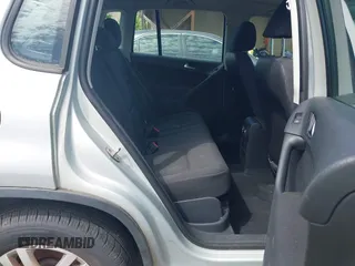2013 Volkswagen Tiguan SE z VIN WVGBV7AX3DW552606, wystawiony jako IAAI lot #42174927 z przebiegiem 164 071 mil mil oraz . Historia ofert i sprzedaży dostępna na DreamBid. Obrazek 8.