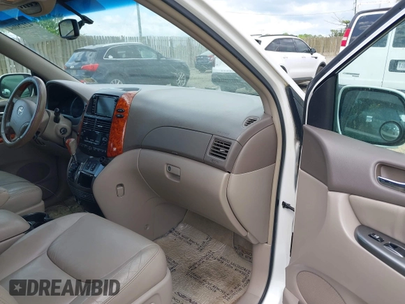 2007 Toyota Sienna XLE with VIN 5TDZK22C57S074123, listed as a IAAI auction lot 42128064 with 184,183 mi miles and . Bid and sale history available at DreamBid. Image 5.