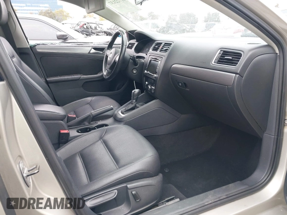 2014 Volkswagen Jetta TDI w/Premium with VIN 3VWLL7AJ3EM231190, listed as a IAAI auction lot 41722137 with 100,965 mi miles and . Bid and sale history available at DreamBid. Image 5.