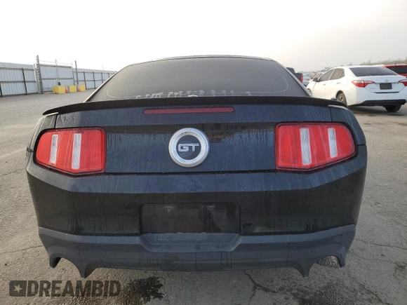 2012 Ford Mustang GT Premium with VIN 1ZVBP8CF6C5271586, listed as a Copart auction lot 83878894 with 101,016 mi miles and Salvage Title. Bid and sale history available at DreamBid. Image 6.