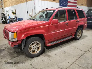 1996 Jeep Grand Cherokee Limited with VIN 1J4GZ78Y3TC186413, listed as a Copart auction lot 82370854 with 261,630 mi miles and Salvage Title. Bid and sale history available at carsss.com. Image 1.