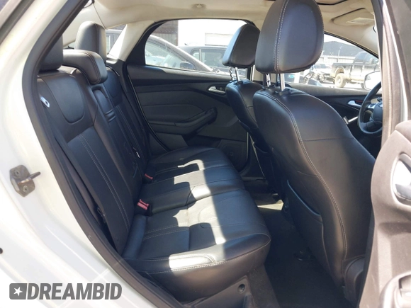 2013 Ford Focus SE with VIN 1FADP3F23DL345170, listed as a IAAI auction lot 41707454 with 140,334 mi miles and . Bid and sale history available at DreamBid. Image 8.
