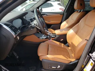 2021 BMW X4 xDrive30i with VIN 5UX2V1C04M9E92675, listed as a Copart auction lot 52495333 with 54,111 mi miles. Bid and sale history available at carsss.com. Image 7.
