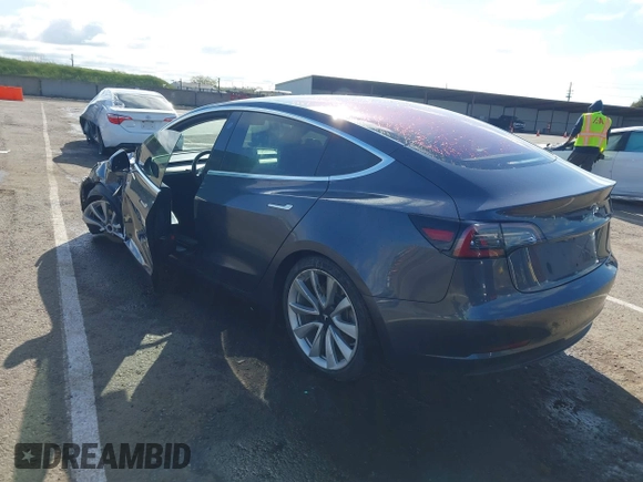 2018 Tesla Model 3 Long Range Battery with VIN 5YJ3E1EA4JF006036, listed as a IAAI auction lot 41934680 with 115,649 mi miles and . Bid and sale history available at DreamBid. Image 3.