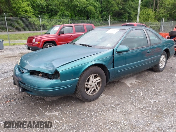 1996 Ford Thunderbird LX z VIN 1FALP62W9TH118637, wystawiony jako IAAI lot #42311641 z przebiegiem 96 361 mil mil oraz . Historia ofert i sprzedaży dostępna na DreamBid. Obrazek 17.