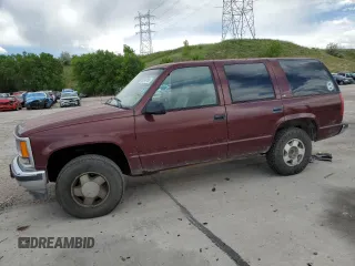 1999 Chevrolet Tahoe Z71 z VIN 1GNEK13R6XR152541, wystawiony jako Copart lot #60540785 z przebiegiem 258 217 mil mil oraz Czysty tytuł • Clean title. Historia ofert i sprzedaży dostępna na DreamBid. Obrazek 1.