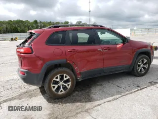 2014 Jeep Cherokee Trailhawk z VIN 1C4PJMBS2EW100476, wystawiony jako Copart lot #55130035 z przebiegiem 136 943 mil mil oraz Szkoda całkowita • Salvage title. Historia ofert i sprzedaży dostępna na DreamBid. Obrazek 3.