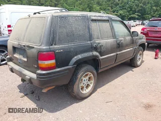 1996 Jeep Grand Cherokee Limited with VIN 1J4GZ78Y9TC351364, listed as a IAAI auction lot 42368001 with 254,634 mi miles and . Bid and sale history available at DreamBid. Image 4.
