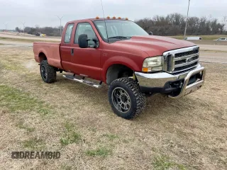 2000 Ford Super Duty F-250 XL with VIN 1FTNX21S6YEC84441, listed as a Copart auction lot 52230615 with 163,757 mi miles and Clean Title. Bid and sale history available at carsss.com. Image 1.