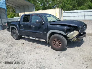 2006 Mitsubishi Raider Duro Cross z VIN 1Z7HC38K26S576434, wystawiony jako Copart lot #53798965 z przebiegiem 198 820 mil mil oraz Szkody całkowita. Historia ofert i sprzedaży dostępna na DreamBid. Obrazek 4.