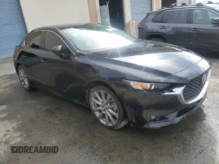 2023 Mazda 3 S Select with VIN 3MZBPABM3PM356635, listed as a Copart auction lot 45229975 with 24,729 mi miles and Clean Title. Bid and sale history available at DreamBid. Image 4.