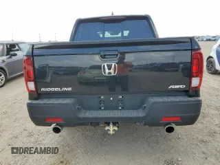 2022 Honda Ridgeline RTL с VIN 5FPYK3F59NB006798, выставлен на аукционе Copart как лот 59574755 с пробегом 49 175 миль миль и Списание • Salvage title. История ставок и продаж доступна на DreamBid. Изображение 6.