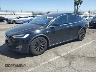 2017 Tesla Model X 90D with VIN 5YJXCBE20HF051099, listed as a Copart auction lot 52208205 with 118,828 mi miles and Salvage Title. Bid and sale history available at DreamBid. Image 1.