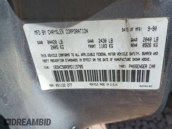 1991 Dodge Dynasty LE z VIN 1B3XC56R9MD115785, wystawiony jako Copart lot #48073715 z przebiegiem 64 483 mil mil oraz Szkoda całkowita • Salvage title. Historia ofert i sprzedaży dostępna na DreamBid. Obrazek 12.