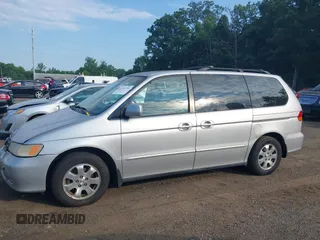 2003 Honda Odyssey EX-L with VIN 5FNRL18913B061340, listed as a IAAI auction lot 42633790 with 1,281,195 mi miles and . Bid and sale history available at DreamBid. Image 13.