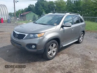 2012 Kia Sorento EX with VIN 5XYKUDA64CG255711, listed as a IAAI auction lot 42625704 with 149,625 mi miles and . Bid and sale history available at DreamBid. Image 2.