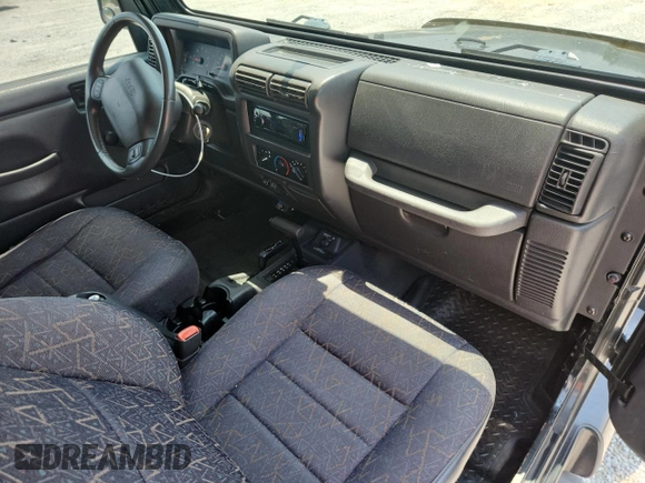 2001 Jeep Wrangler Sport с VIN 1J4FA49S91P347090, выставлен на аукционе Copart как лот 60436405 с пробегом 141 172 миль миль и Списание • Salvage title. История ставок и продаж доступна на DreamBid. Изображение 8.