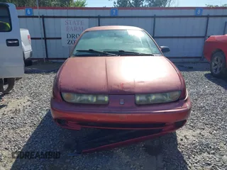 1998 Saturn SL z VIN 1G8ZK5270WZ223002, wystawiony jako IAAI lot #41959507 z przebiegiem Nie podano mil oraz . Historia ofert i sprzedaży dostępna na DreamBid. Obrazek 12.
