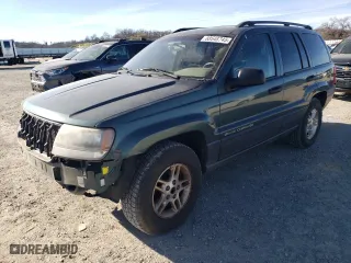 2002 Jeep Grand Cherokee Laredo with VIN 1J4GW48S52C169047, listed as a Copart auction lot 88548745 with 160,258 mi miles and Salvage Title. Bid and sale history available at carsss.com. Image 1.