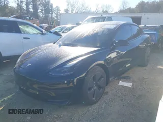 2022 Tesla Model 3 with VIN 5YJ3E1EA9NF147836, listed as a IAAI auction lot 41363603 with 28,748 mi miles. Bid and sale history available at carsss.com. Image 19.