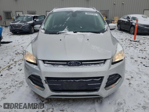 2015 Ford Escape Titanium with VIN 1FMCU0J95FUB26074, listed as a Copart auction lot 88052385 with 167,475 mi miles and Clean Title. Bid and sale history available at DreamBid. Image 5.