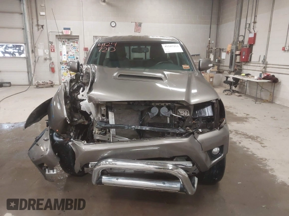 2013 Toyota Tacoma with VIN 5TFUU4EN3DX055489, listed as a IAAI auction lot 41247213 with 58,570 mi miles and . Bid and sale history available at DreamBid. Image 13.
