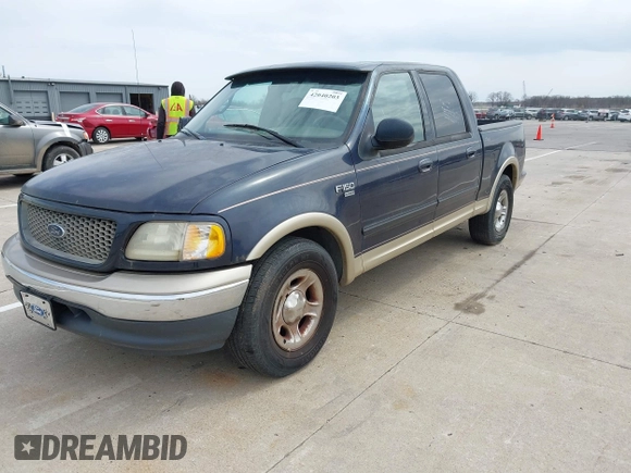 2001 Ford F-150 XLT with VIN 1FTRW07L01KE17954, listed as a IAAI auction lot 42040203 with Not provided miles and . Bid and sale history available at DreamBid. Image 2.