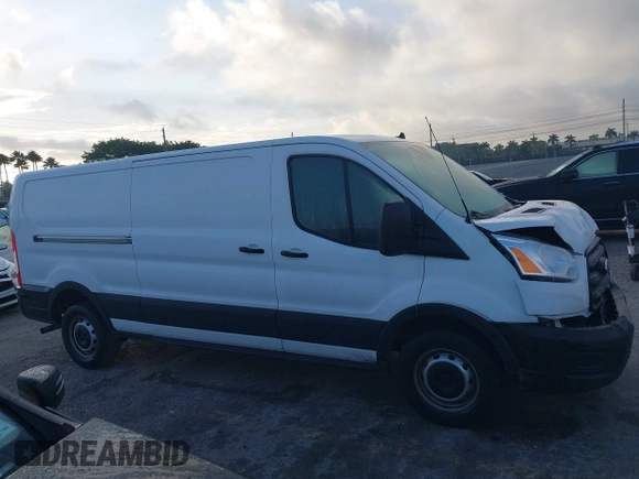 2020 Ford Transit Cargo with VIN 1FTBR1Y80LKB45384, listed as a IAAI auction lot 41479703 with 63,232 mi miles and . Bid and sale history available at DreamBid. Image 13.